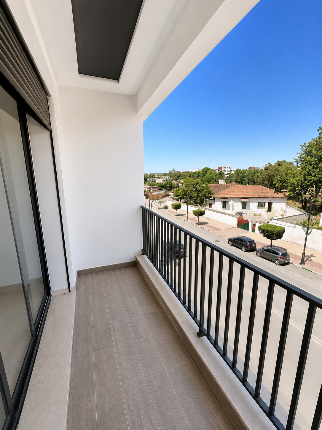 Bedroom window — open outlook toward Quartier Génie